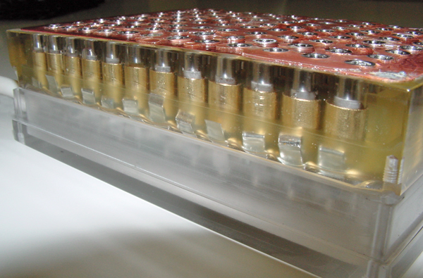 Arrangement of final containment vessels configured for simultaneous multi-sample sterilization, resembling a deployed laboratory-ready setup.